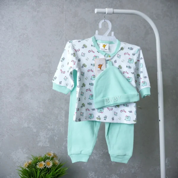 2-piece baby outfit set with mint green pants, printed long-sleeve top, and matching baby hat, displayed on hanger against a gray background.