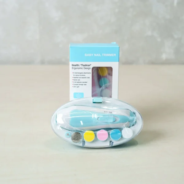 A set of baby nail trimmers with ergonomic design, displayed with their packaging. The trimmer set includes multiple interchangeable nail pads for different ages, with color-coded options for safe and gentle trimming. The packaging highlights features such as LED light, 360° rotation, and battery operation for easy use. The main trimmer is showcased in a transparent case with different grinding pads neatly arranged inside.