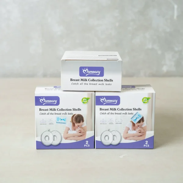Three boxes of Moneasy Breast Milk Collection Shells stacked on a light background, featuring BPA-free labeling and product imagery.