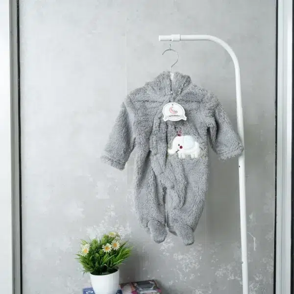 fleece baby romper with hood and animal ears, featuring paw print knee accents, front zipper, and snap-button leg openings, displayed on a flat surface.