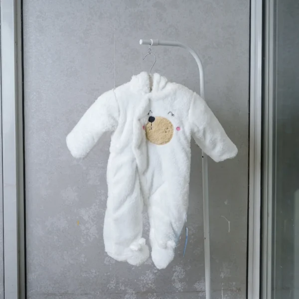 fleece baby romper with hood and animal ears, featuring paw print knee accents, front zipper, and snap-button leg openings, displayed on a flat surface.