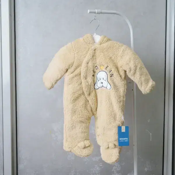 fleece baby romper with hood and animal ears, featuring paw print knee accents, front zipper, and snap-button leg openings, displayed on a flat surface.