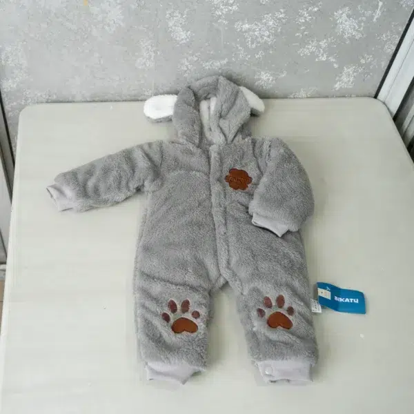 fleece baby romper with hood and animal ears, featuring paw print knee accents, front zipper, and snap-button leg openings, displayed on a flat surface.
