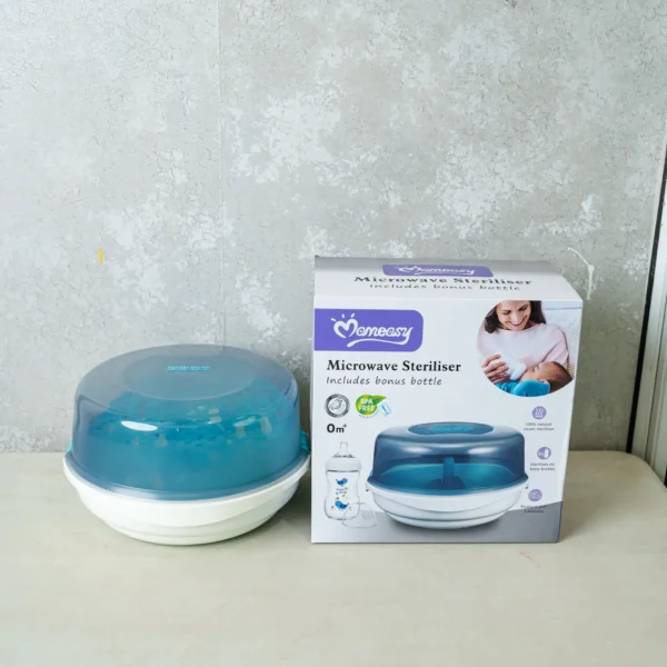 Microwave sterilizer fully assembled with a closed lid, placed next to its retail packaging box on a light-colored surface.